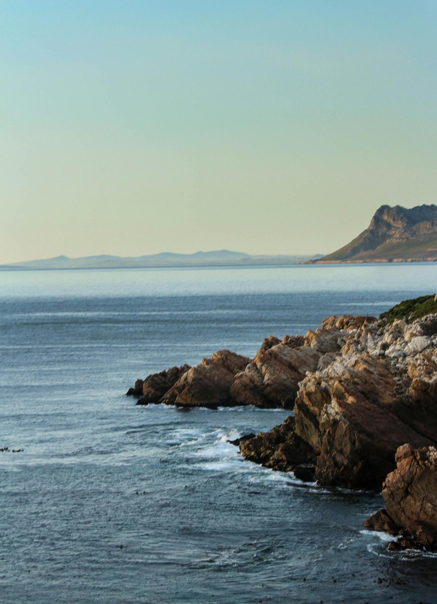 Discover the breathtaking rocky coastline of Cape Town, South Africa. Perfect for travel inspiration.